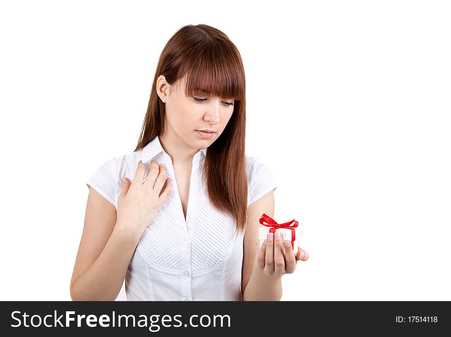 The beautiful girl with a gift in hands