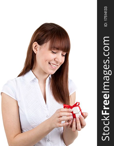 The beautiful girl with a gift in hands