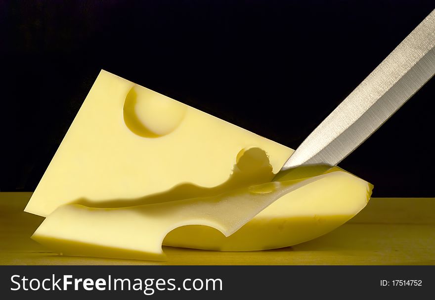 Cutting the cheese reveals lying-girl shaped shadow. Cutting the cheese reveals lying-girl shaped shadow