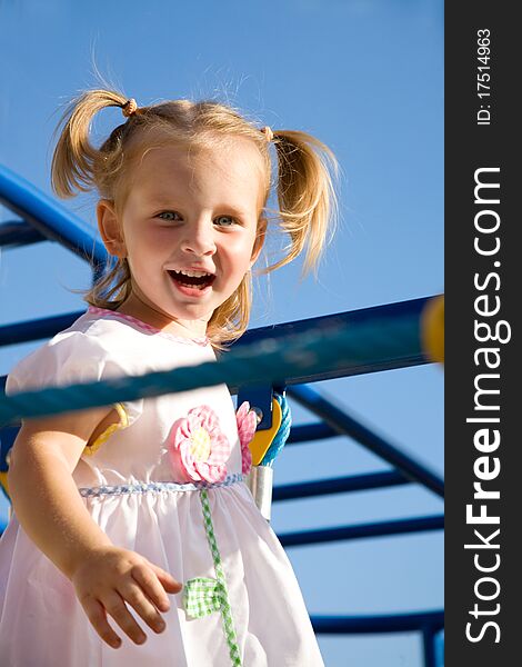 Happy little girl on playground