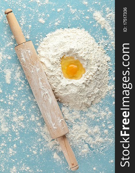 Broken egg on flour, means for making bread