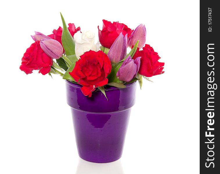Red roses and purple tulips