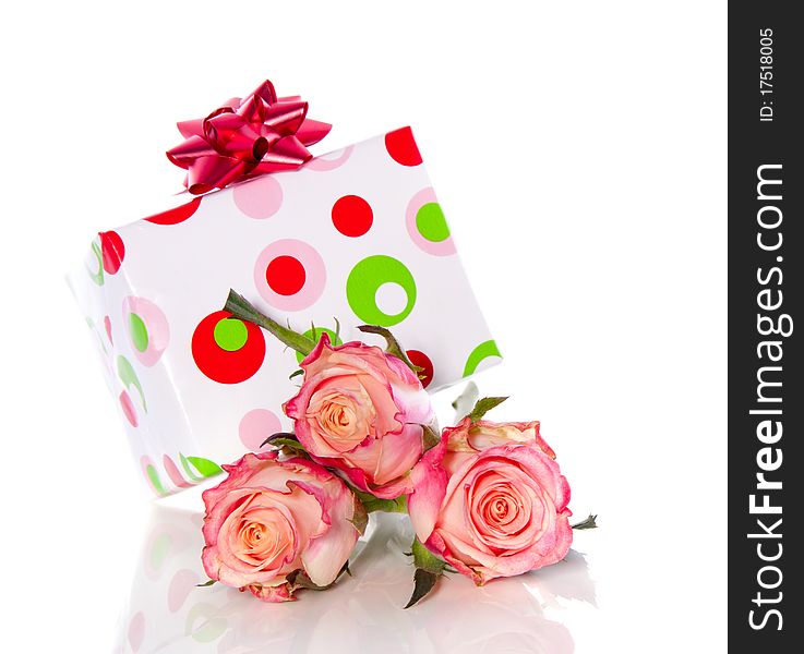 Gift And Pink Roses
