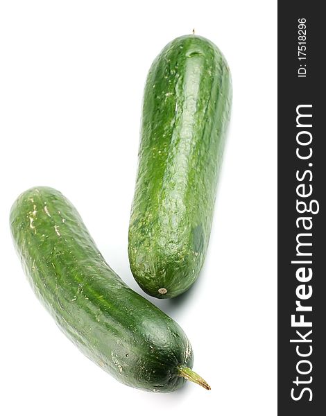 Two cucumbers isolated on white