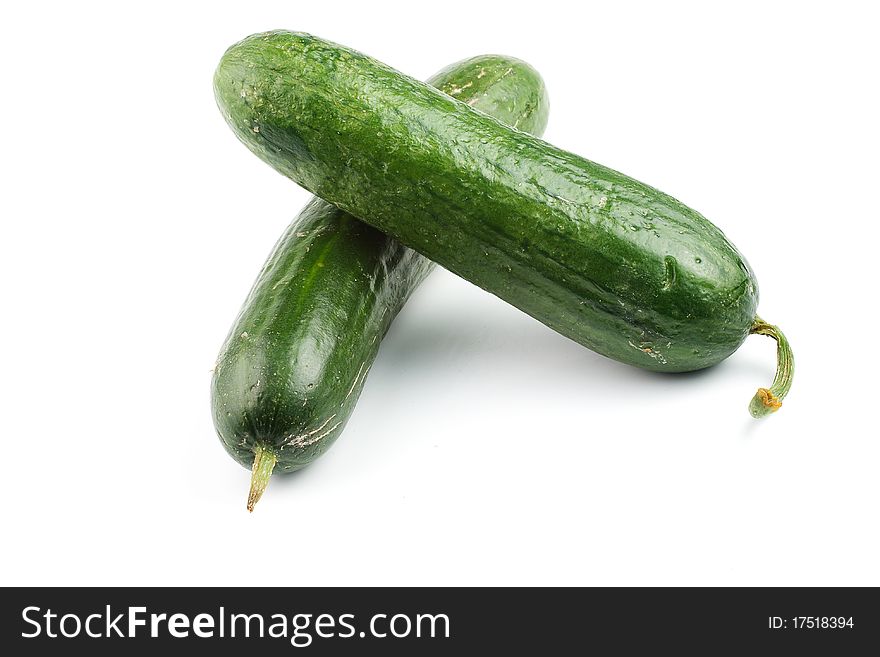 Two cucumbers isolated on white