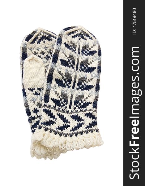 Woollen winter mittens with an ornament. On a white background. Woollen winter mittens with an ornament. On a white background