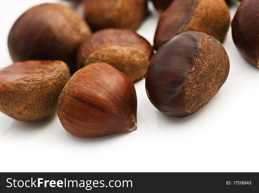 Ripe brown chestnuts close up