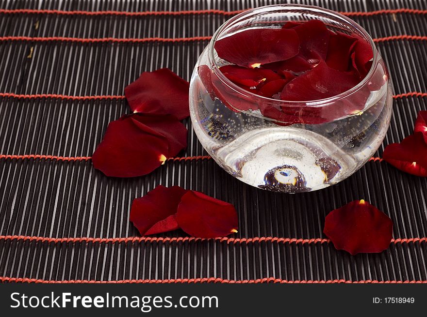 Rose petals and bowl of water