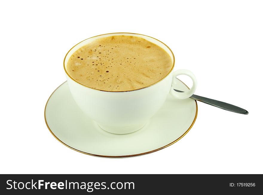 Classic white cup cappuccino and saucer with teaspoon. Image is isolated on white and the file includes a clipping path. Classic white cup cappuccino and saucer with teaspoon. Image is isolated on white and the file includes a clipping path.