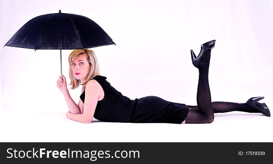 Under an umbrella lies on the floor. Under an umbrella lies on the floor