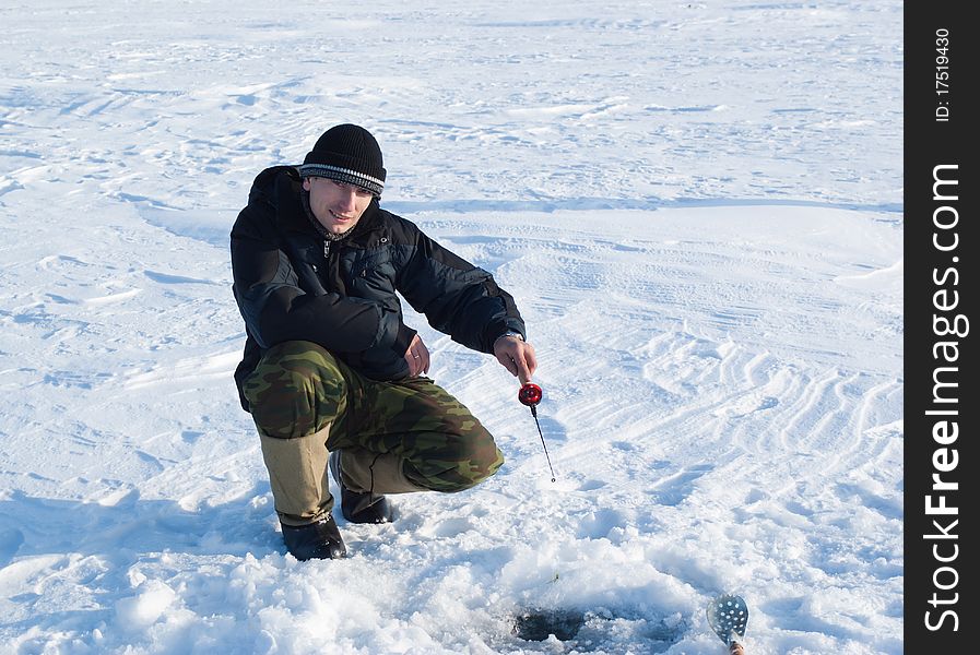 The fisherman on winter fishing. Russia, Transbaikalia.