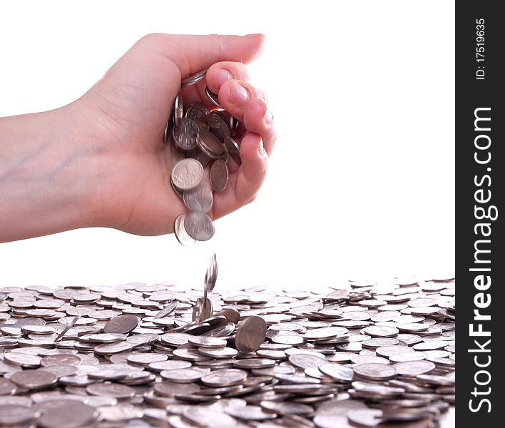 Woman's hands holding a handful of coins. Woman's hands holding a handful of coins