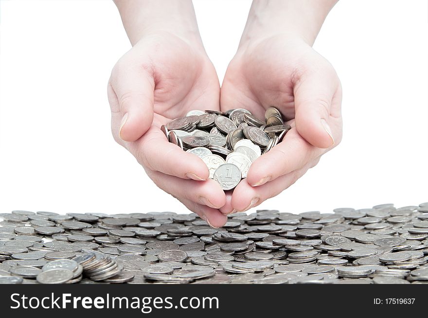 Woman's hands holding a handful of coins. Woman's hands holding a handful of coins