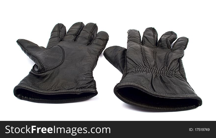 Black leather gloves with a white background