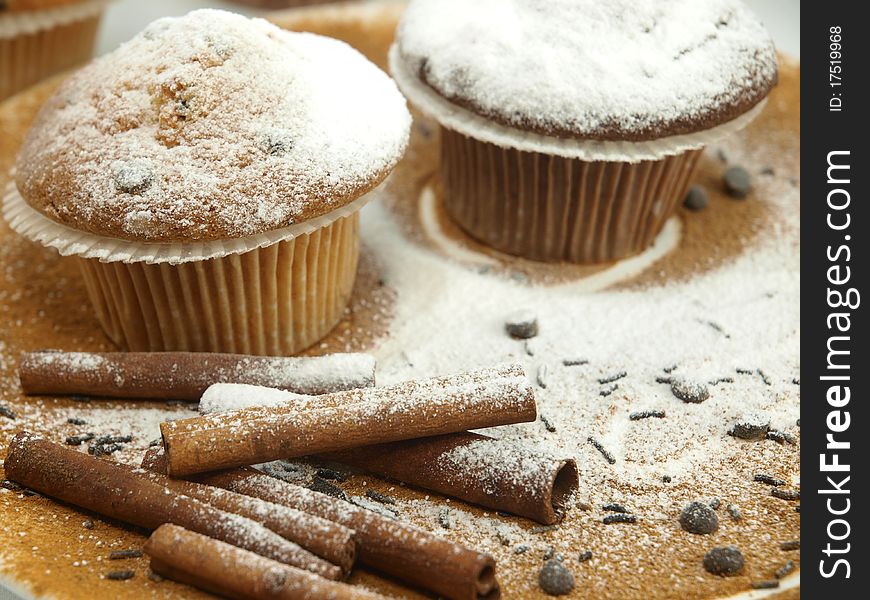 Fresh baked muffins over the cinnamon