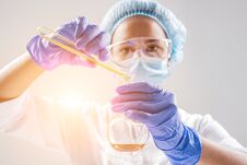 Scientist Pouring Organic Oil. Beauty And Cosmetics Sciences. Stock Images
