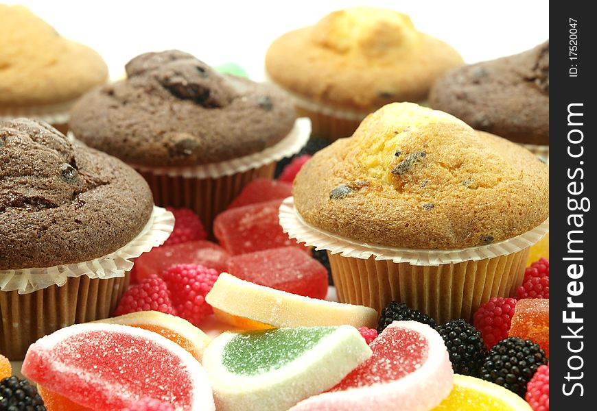 Fresh baked muffins and sugar candies