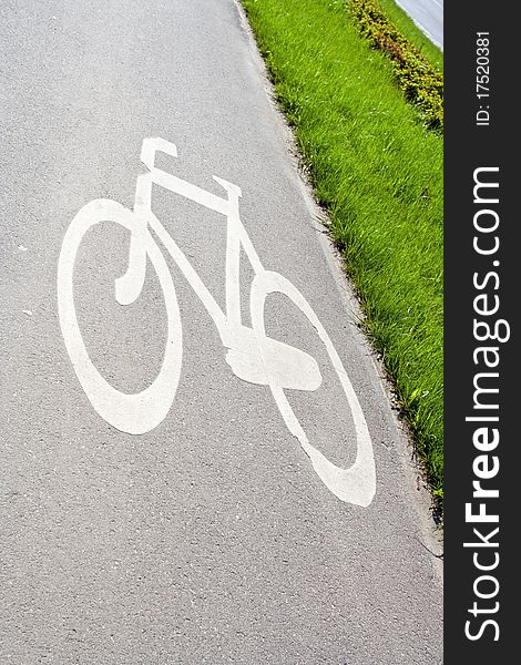 Bike path in city with sign