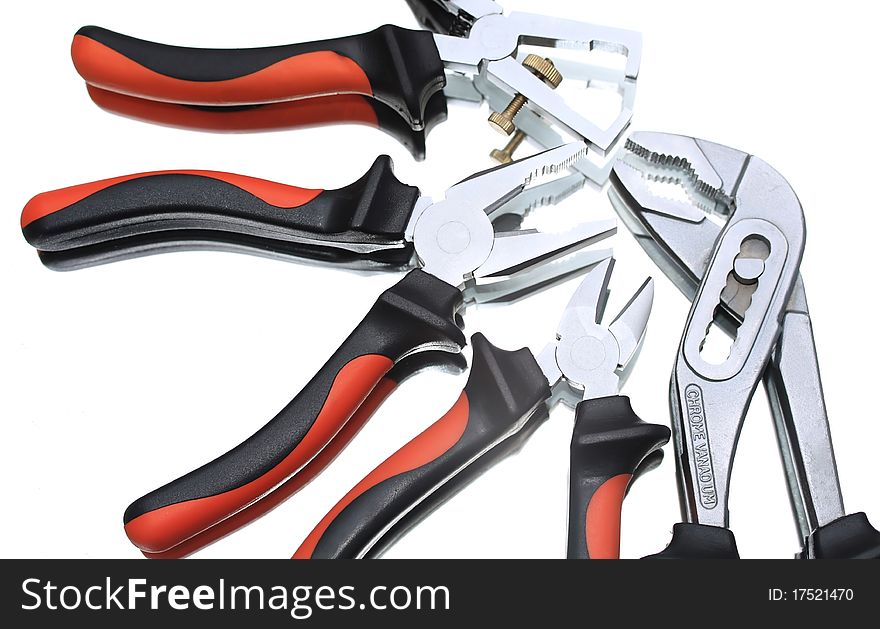 Composition of pliers with mirror reflection. Composition of pliers with mirror reflection