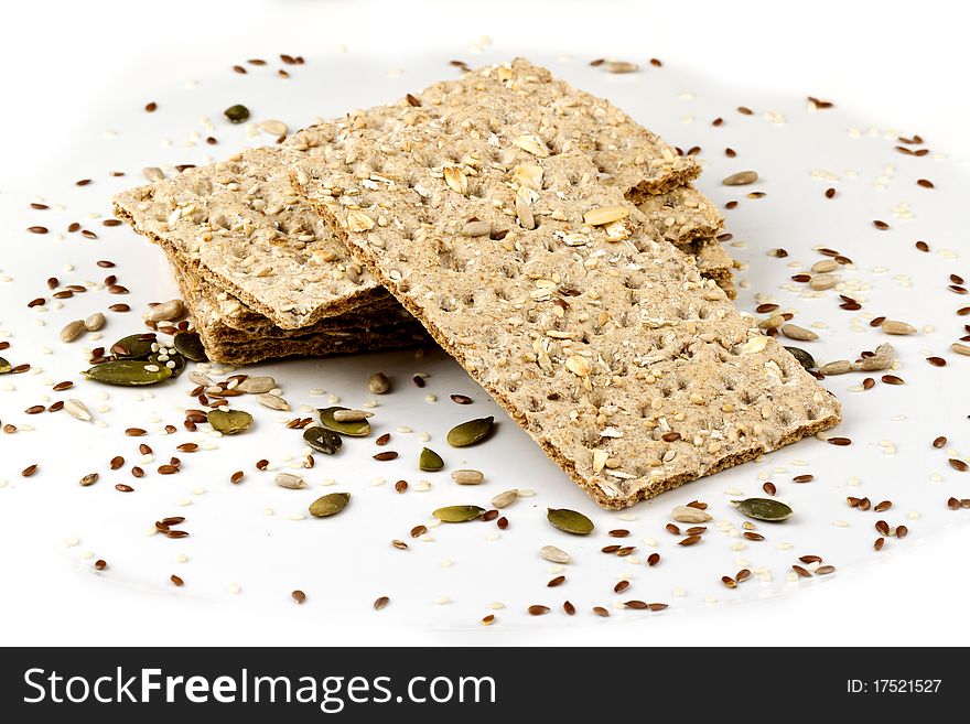 Crispy bread isolated with assorted seeds