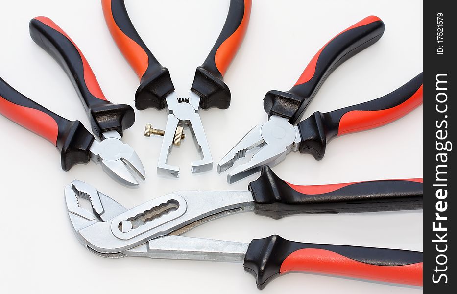 Composition of four different pliers. Composition of four different pliers
