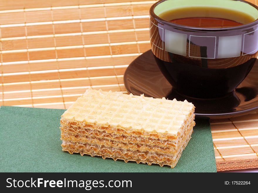 Cake and tea in a cup