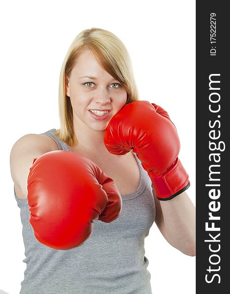 Young woman with red boxing gloves - isolated on white. Young woman with red boxing gloves - isolated on white