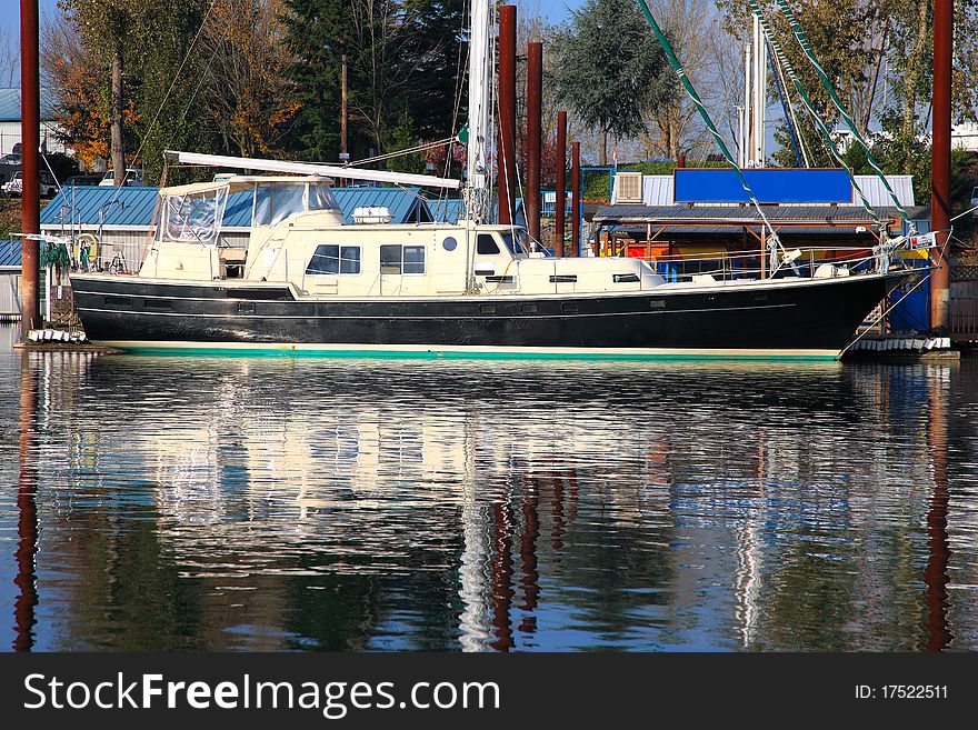 A sailboat marked for a repair and possibly a paint job. A sailboat marked for a repair and possibly a paint job.