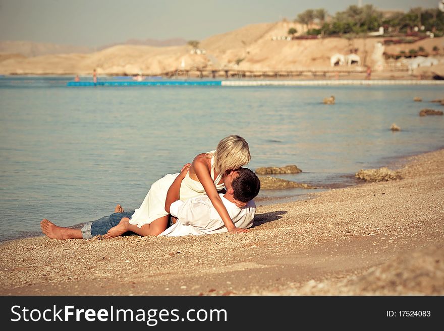 Couple kissed on beach happiness, smile. Couple kissed on beach happiness, smile