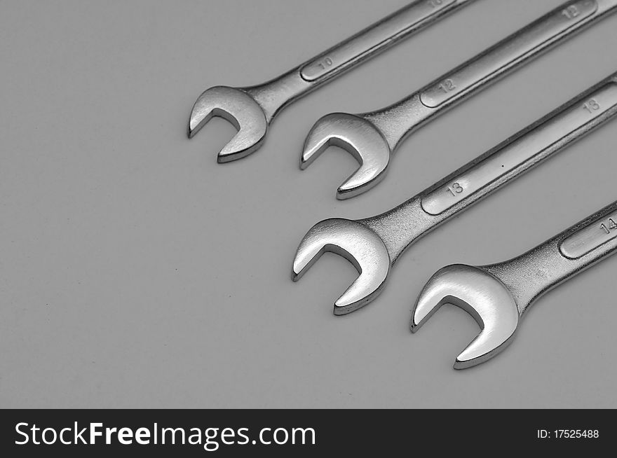 A set of spanners isolated on a light background