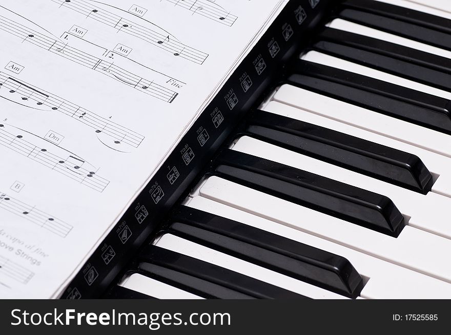 Close up shot of black and white keys of a piano. Close up shot of black and white keys of a piano