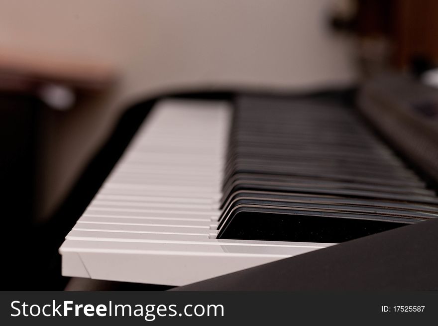 Close up shot of black and white keys of a piano. Close up shot of black and white keys of a piano
