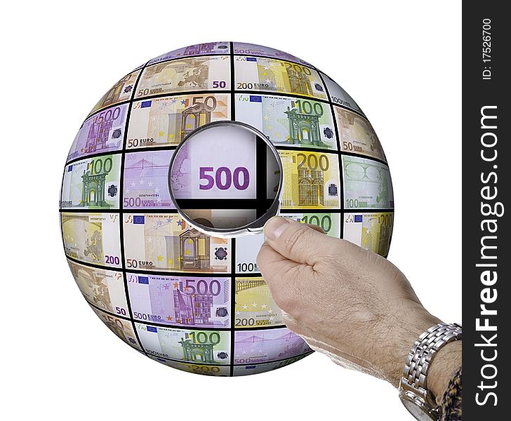 This picture shows a hand with a magnifying glass on a sphere of banknotes. This picture shows a hand with a magnifying glass on a sphere of banknotes