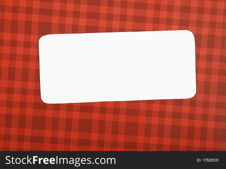 Greeting Christmas card with a red background white sheet of paper on which you can write a text