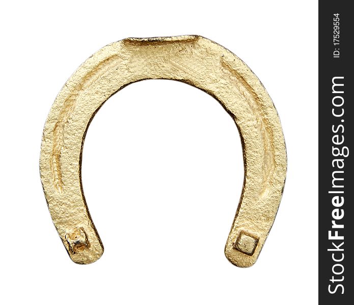 Talisman brings good luck horseshoe covered in gold paint. Talisman brings good luck horseshoe covered in gold paint
