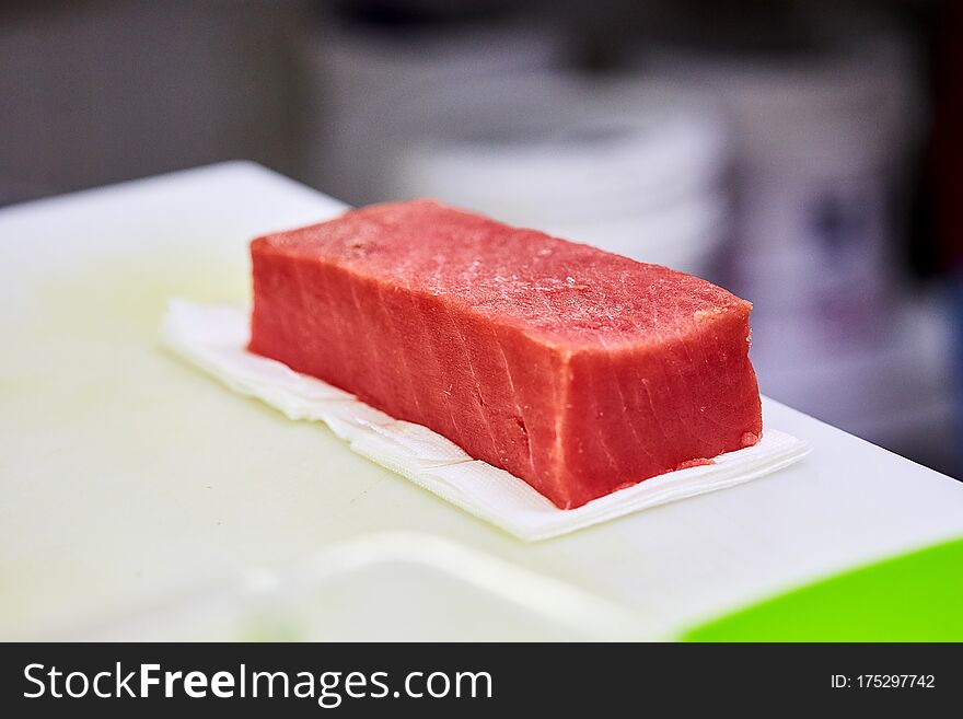 Steak of  Tuna Fish Fillet on a cutting board -  Fish and Seafood
