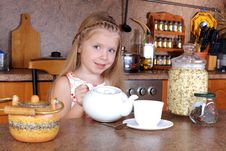 Girl With Teapot And Cup Of Hot Drink Stock Photography Girl With Teapot And Cup Of Hot Drink Stock Photography