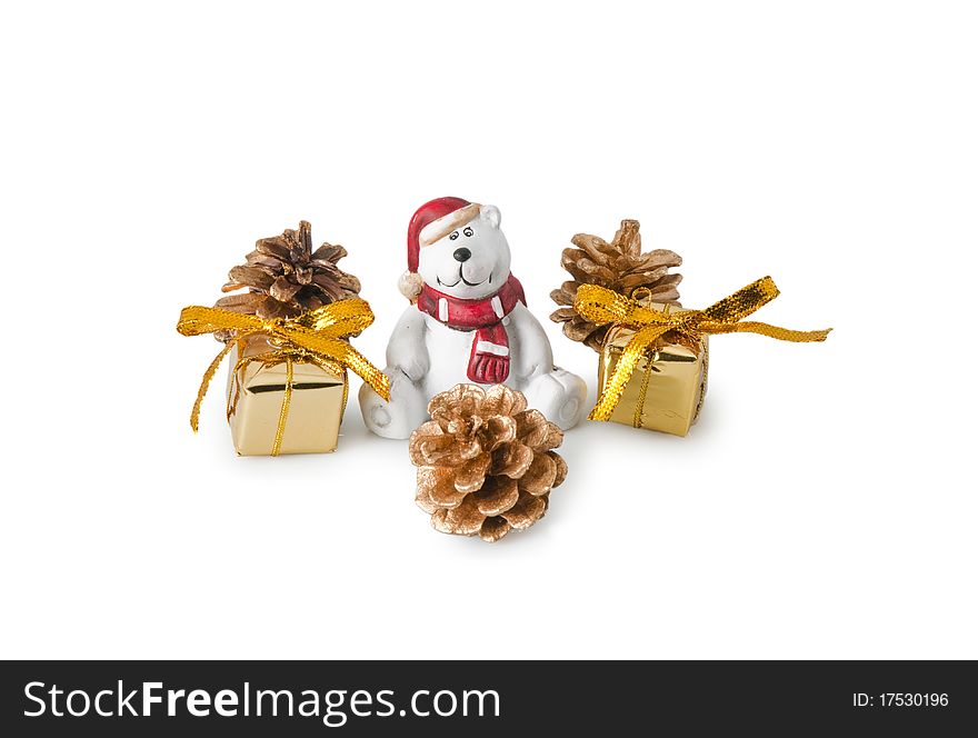 Bear figurine with gifts isolated on a white background