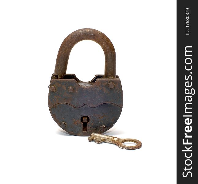 Old rusty padlock and key on white background. Old rusty padlock and key on white background.