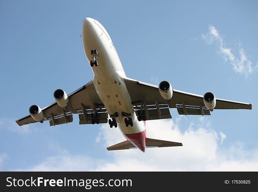 Large passenger aircraft from below. Large passenger aircraft from below