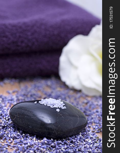 Luxury with lavender bath salts on black stone. Luxury with lavender bath salts on black stone