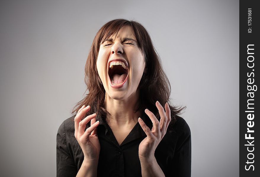 Portrait of a woman screaming. Portrait of a woman screaming