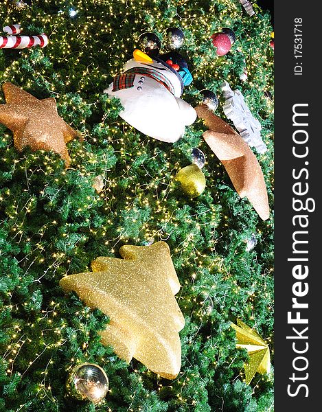 Decorate a outdoor Christmas tree with star and Christmas lights , Merry Christmas