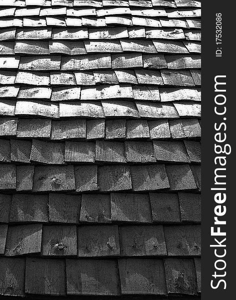 Roofing made of shingles in black and white.