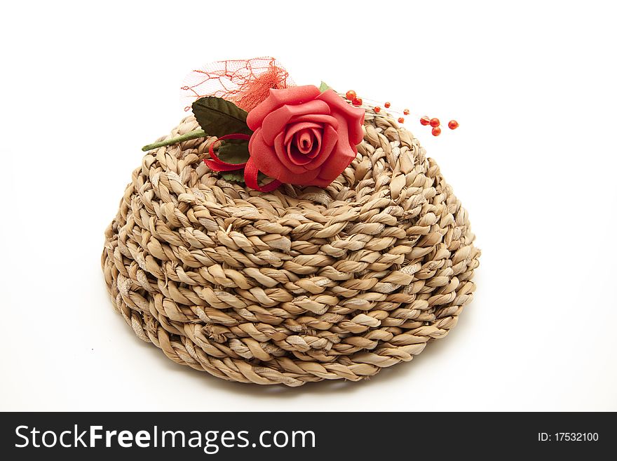 Red rose onto woven basket