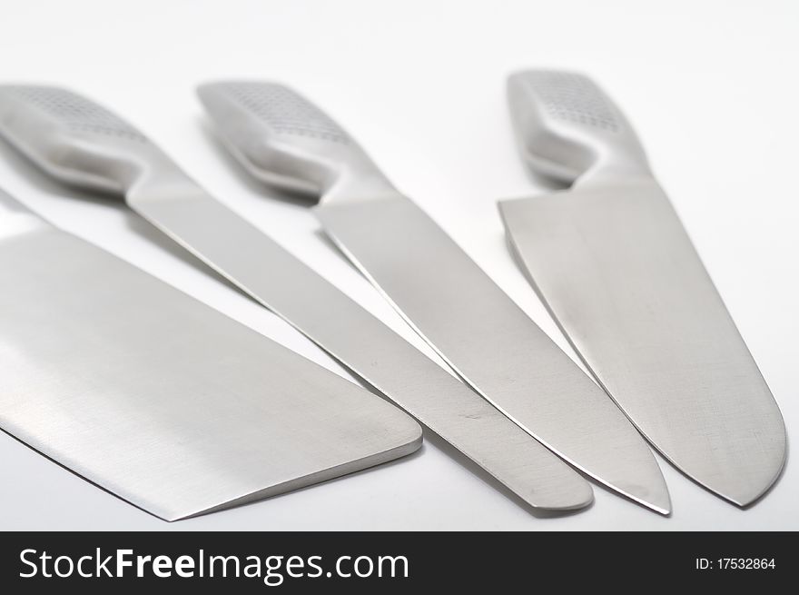 Three kitchen knifes isolated in a white background. Three kitchen knifes isolated in a white background