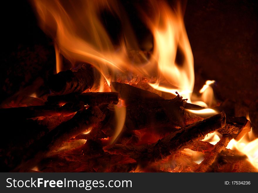 Flaring fire on a black background. Flaring fire on a black background