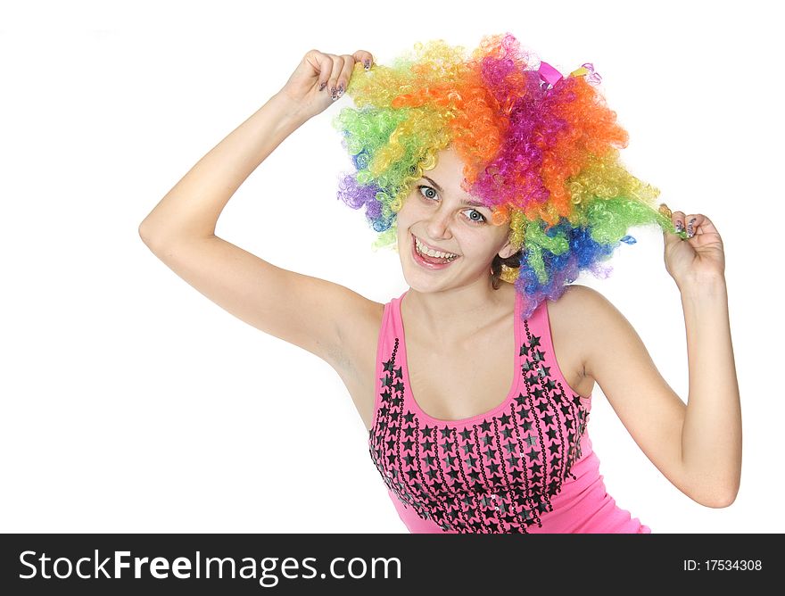 Happy woman in clownish wig over white