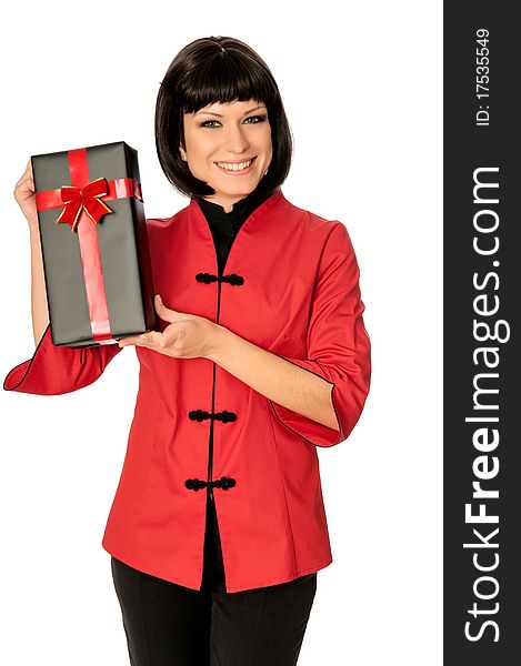 The happy woman dressed in Chinese style has bought a gift at a discount. The happy woman dressed in Chinese style has bought a gift at a discount