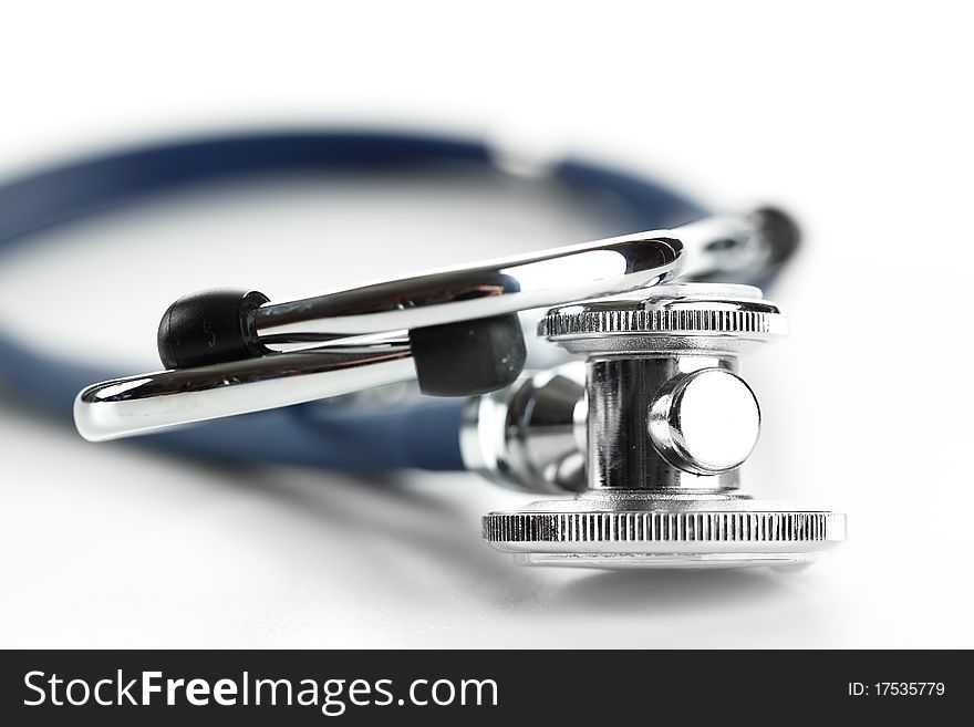 Blue stethoscope on a white background